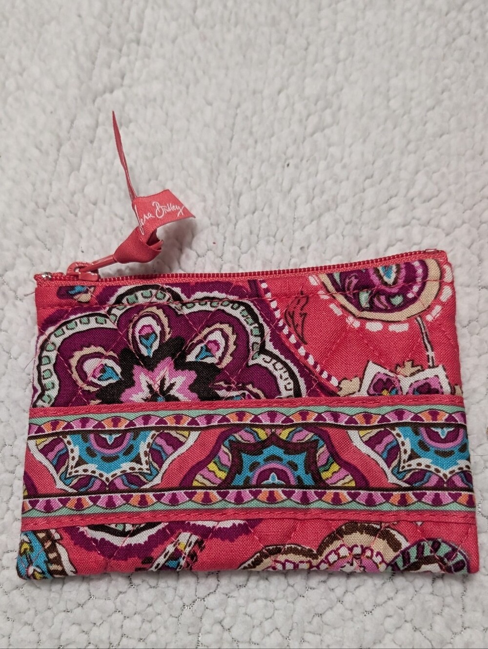 Vera Bradley zip wallet in the retired "Call Me Coral" pattern, featuring a pink